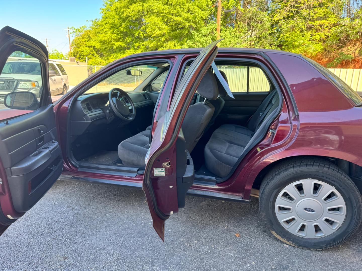 2011 Maroon Ford Crown Victoria (2FABP7BV8BX) , located at 307 West Marshall Avenue, Longview, TX, 75601, (903) 753-3091, 32.500828, -94.742577 - Photo#3